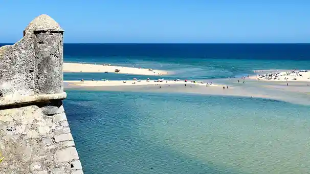 Sandbanks and crystal-clear water at the Cacela Velha inlet