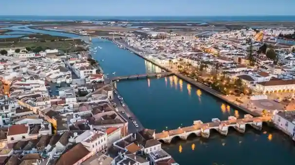 Aerial view of Tavira and the Gilão River at dusk